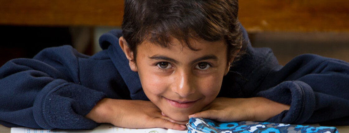 Education for Syrian refugee children Boy smiling